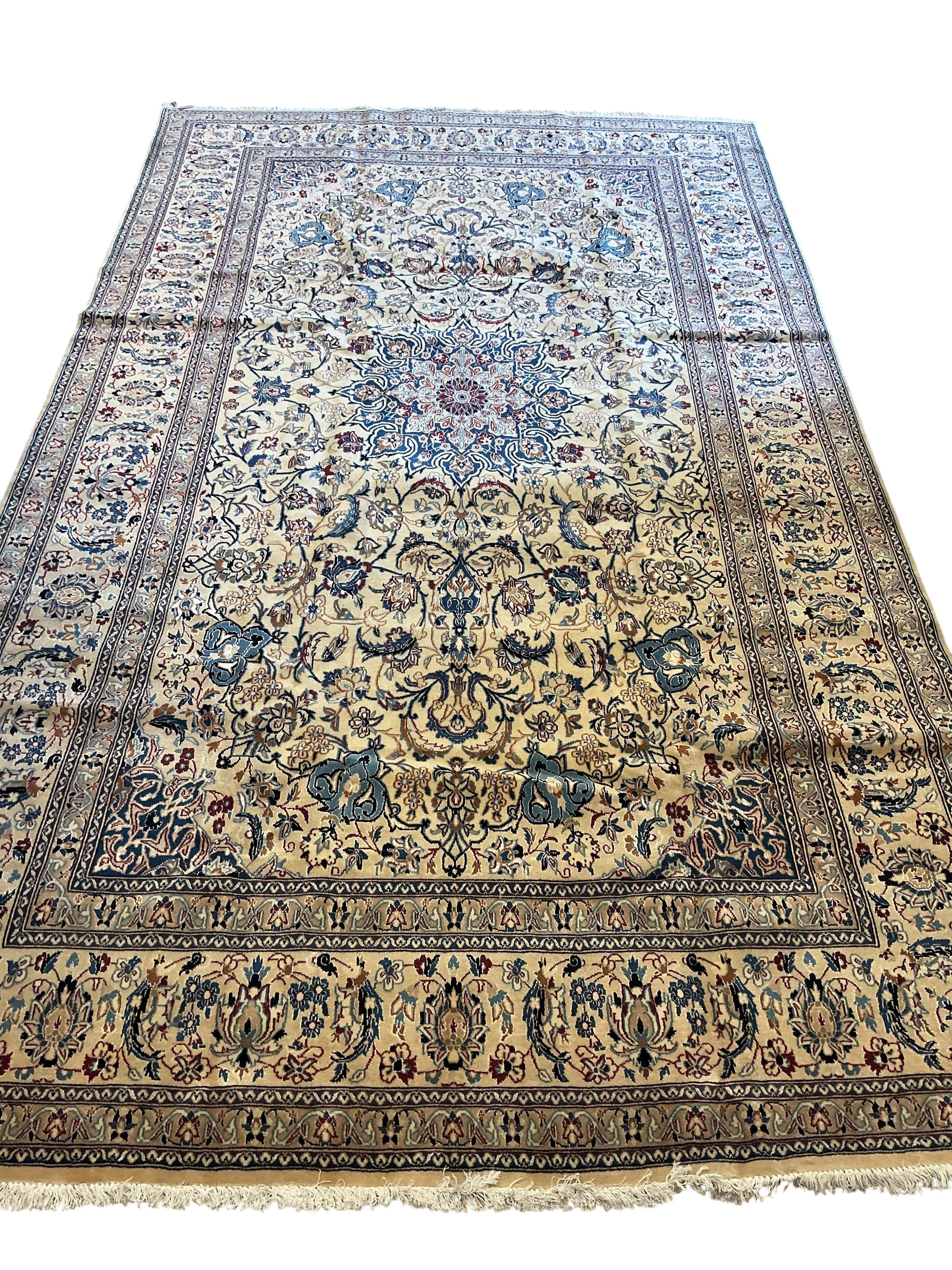 A Nain ivory ground carpet, 341 x 200cm
